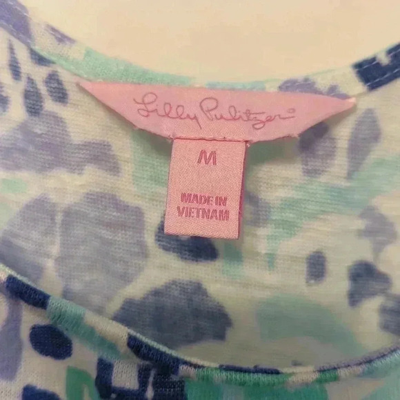 Lilly Pulitzer dress with unique hemline fringe and crisscross in back. Medium - Picture 2 of 6